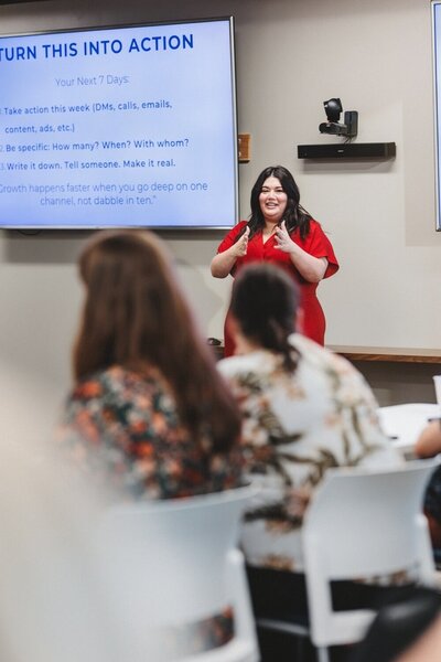 Tiffany King presenting a marketing session to a seated audience